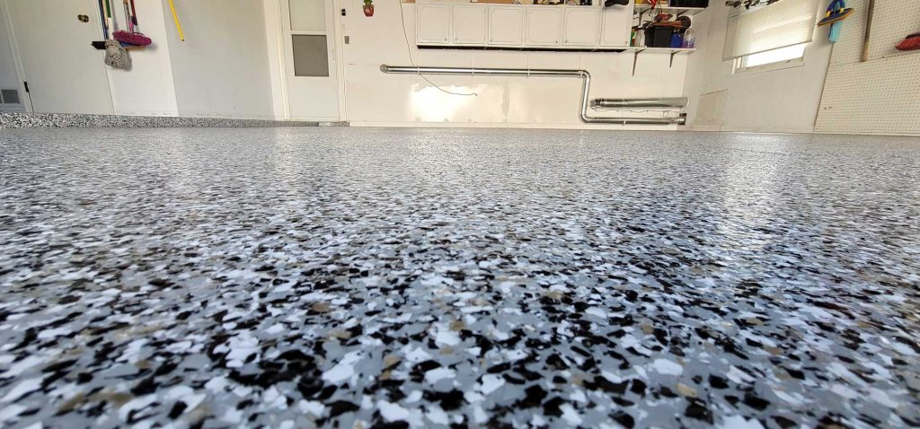 epoxy flooring with camo like pattern